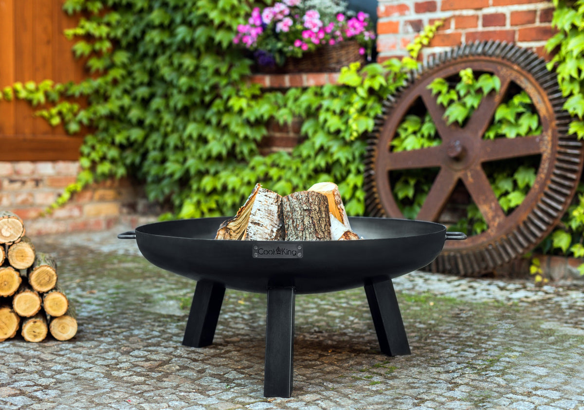 Cook King Polo 70cm Fire Bowl in an outdoor setting