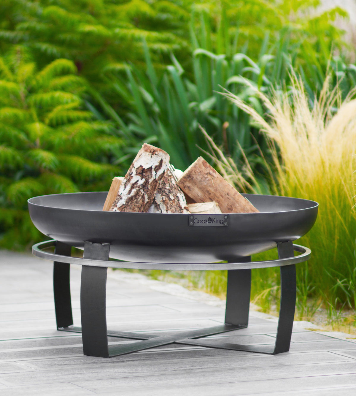 Cook King Viking 60cm Fire Bowl in an outdoor setting