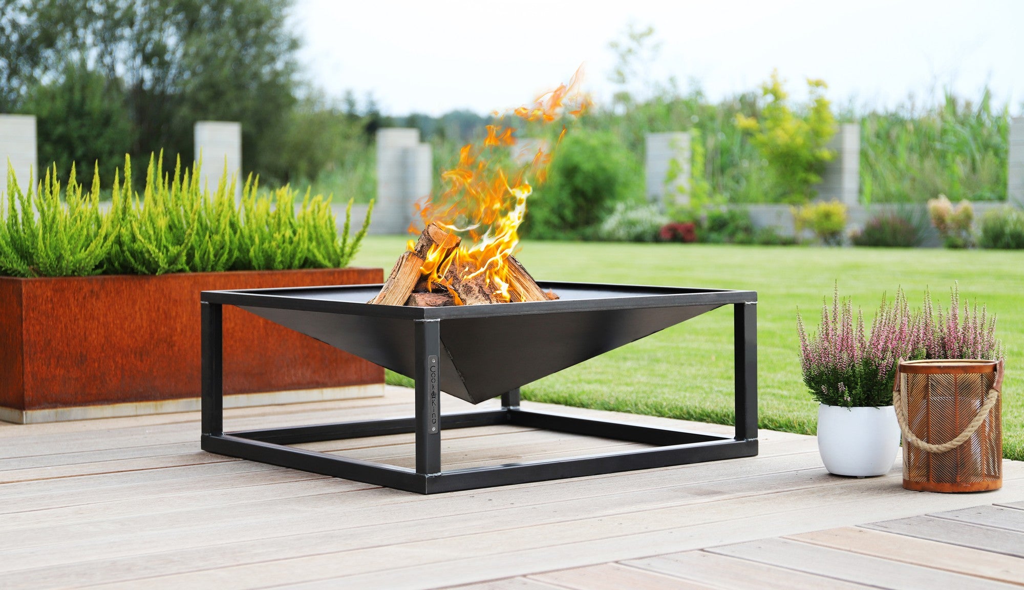 Cook King Square 70x70cm Fire Bowl in an outdoor setting