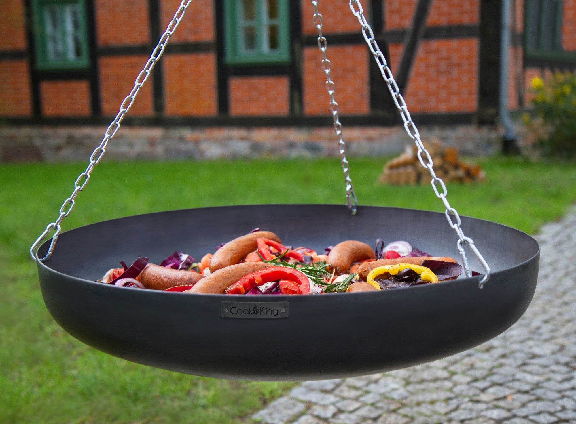 Cook King 180 cm Tripod Wok with Winch and 60 cm Natural Steel Wok, outdoor lifestyle shot 4