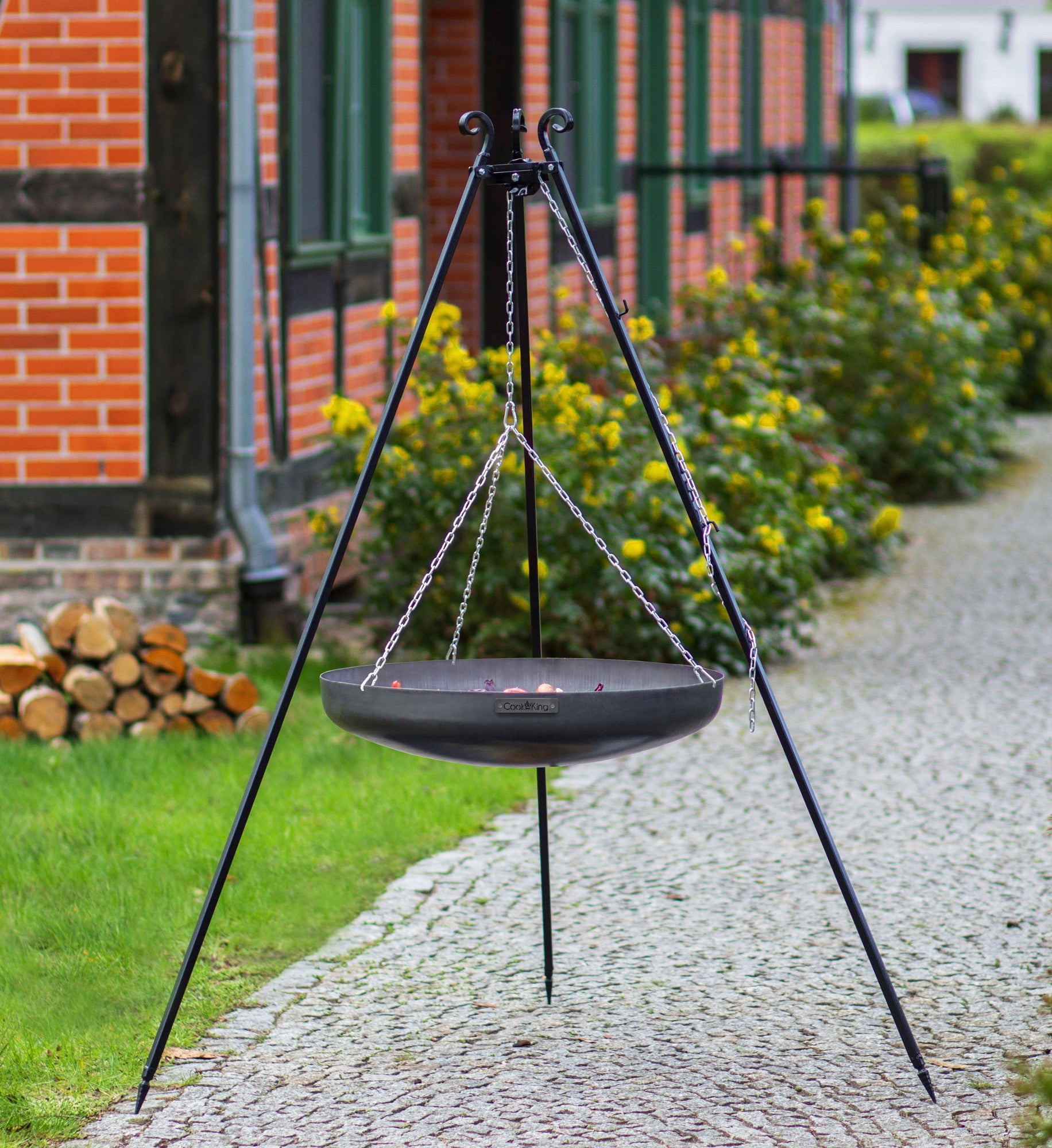 Cook King 180 cm Tripod with 60 cm Natural Steel Wok in an outdoor setting