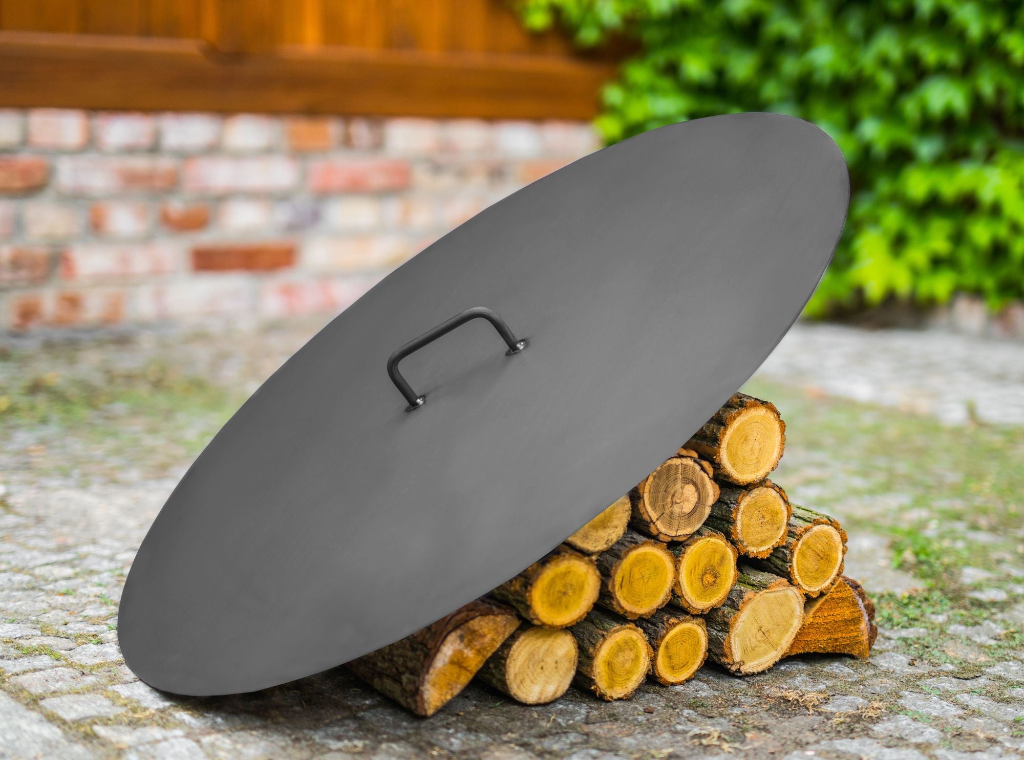 Cook King 72,0 cm Lid for Fire Bowl in an outdoor setting